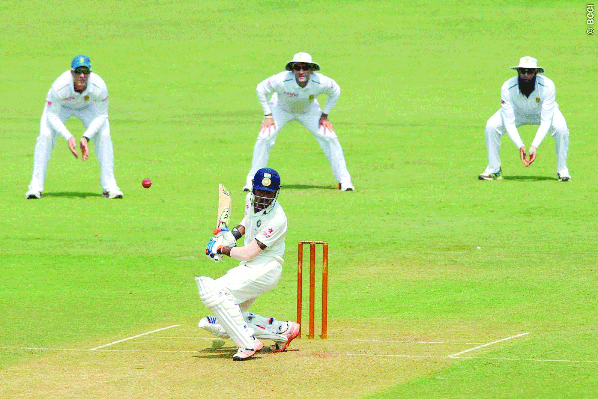 Rahul, Ojha fifties stabilise Board XI