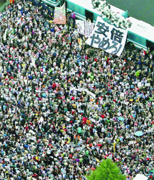 Tens of thousands protest outside Japan Parl