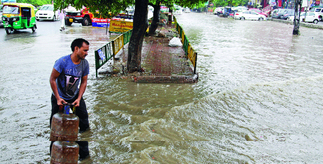 Torrential rain throws traffic out of gear