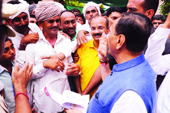 Guj CM to camp at flood-hit dists