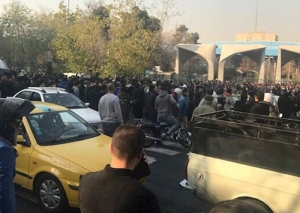 Iran protests continue into third night