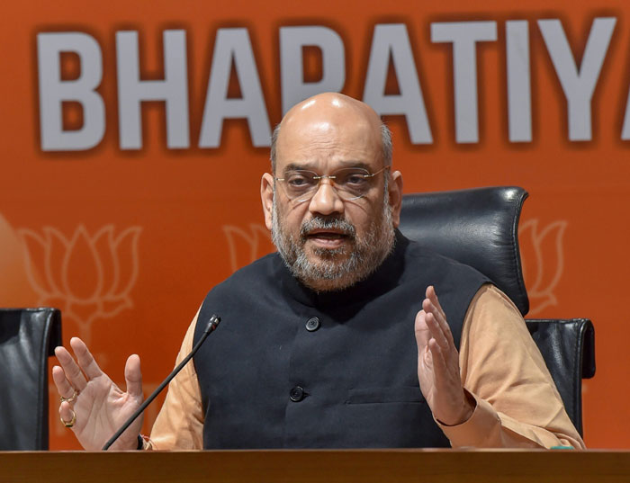 Amit Shah dares Cong to clear stand on OBC bill