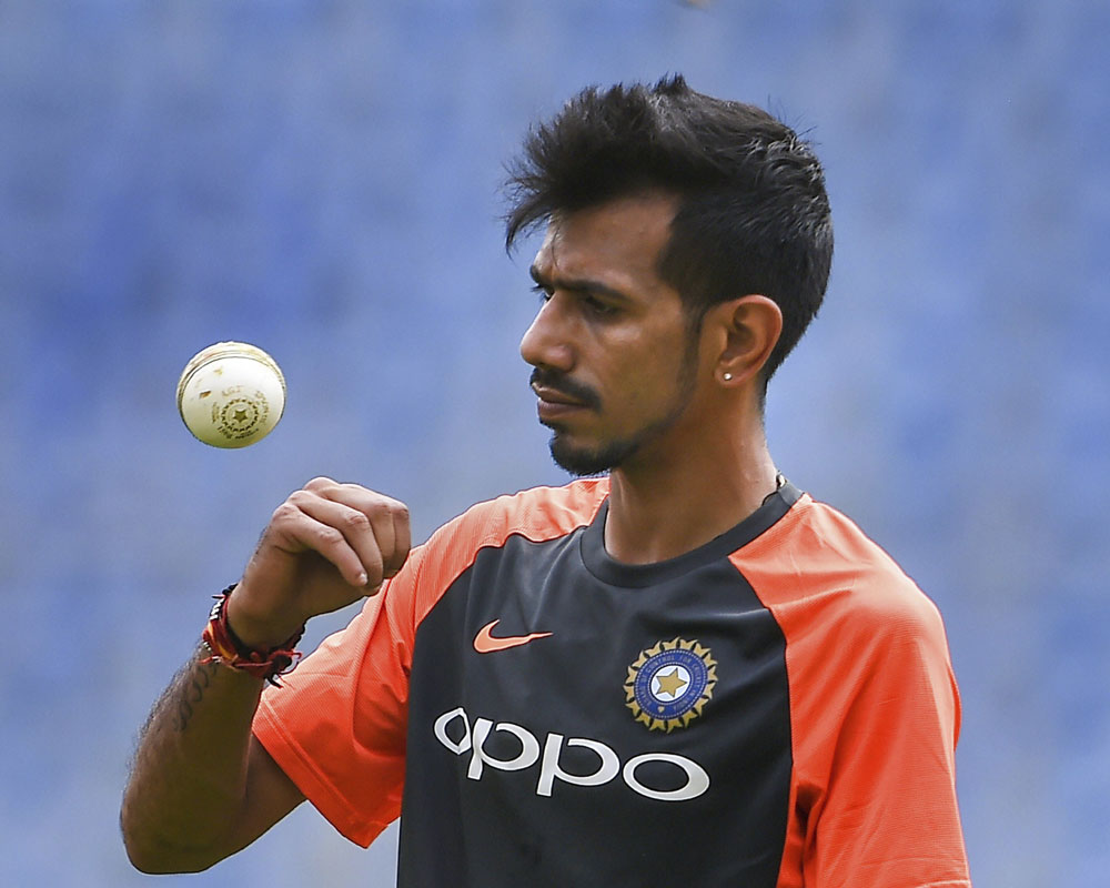 Chahal reaches career high 8th in ICC rankings, Dhawan drops four places