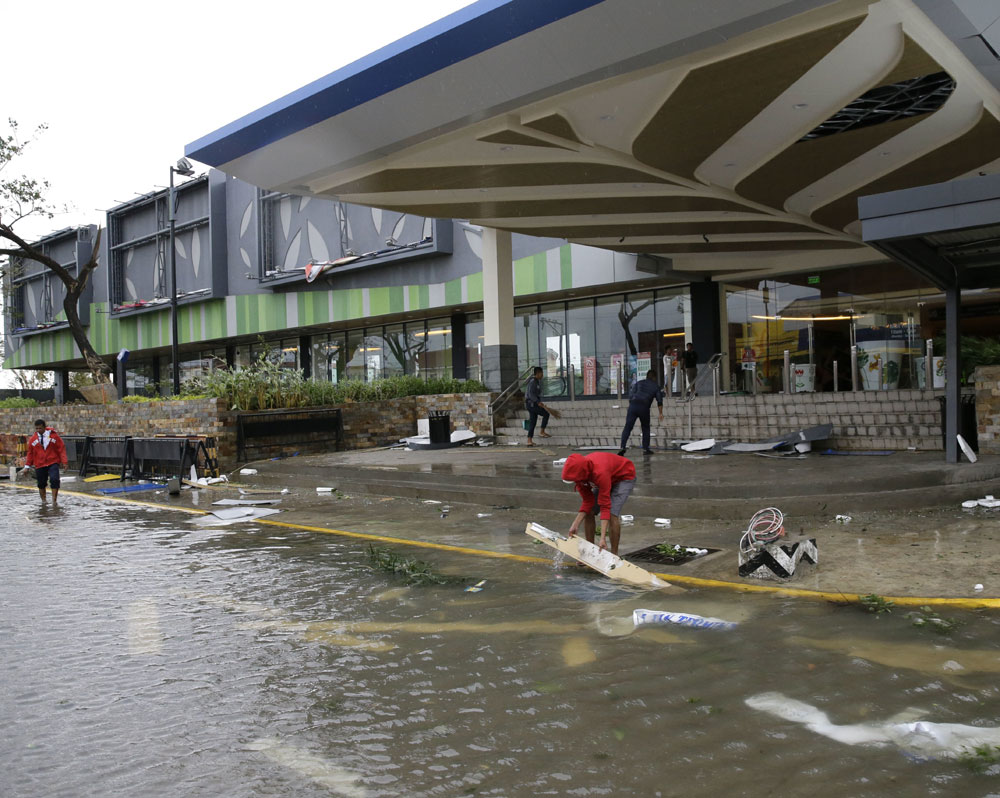 Ferocious typhoon plows through rain-soaked Philippines