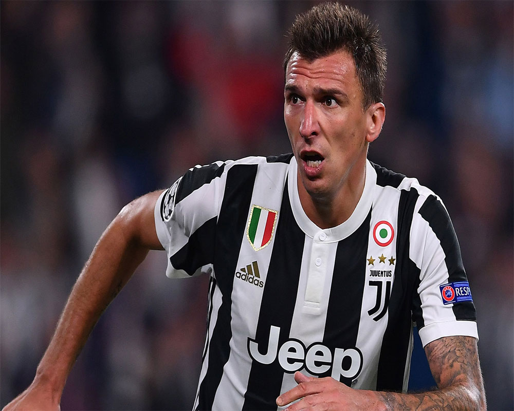 Mandzukic fires Juventus into Champions League last 16