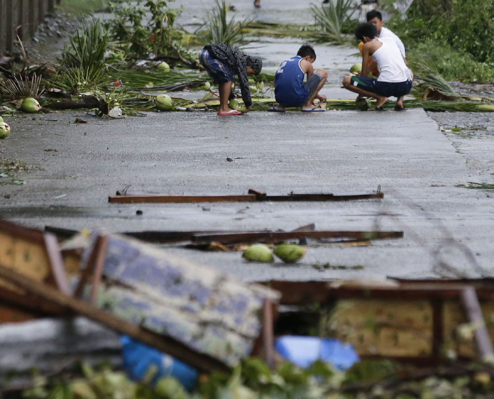 Powerful typhoon lashes Philippines, killing at least 12