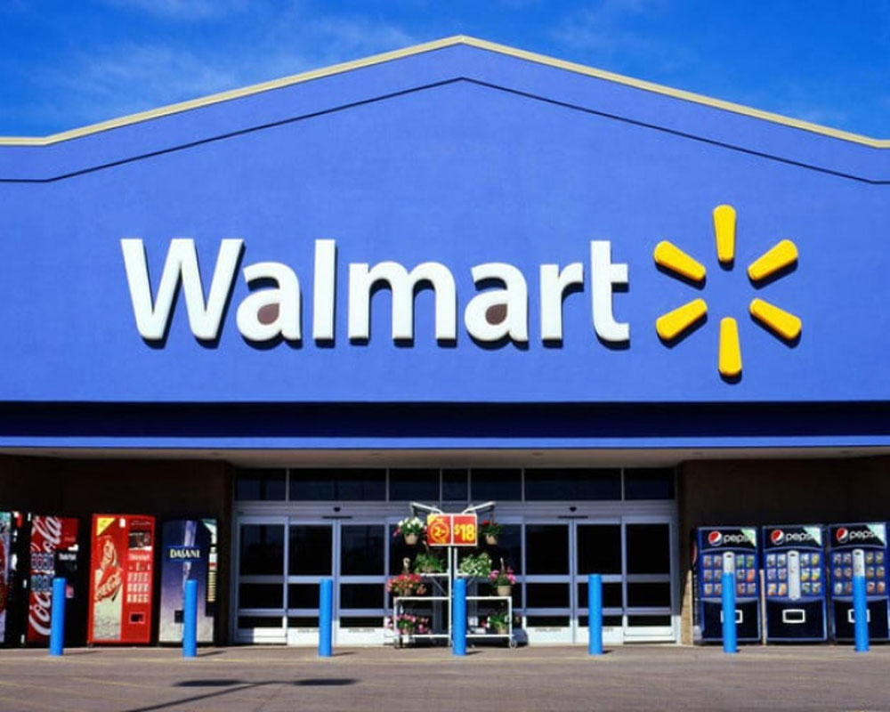 Walmart raises annual earnings estimate on higher quarterly revenue