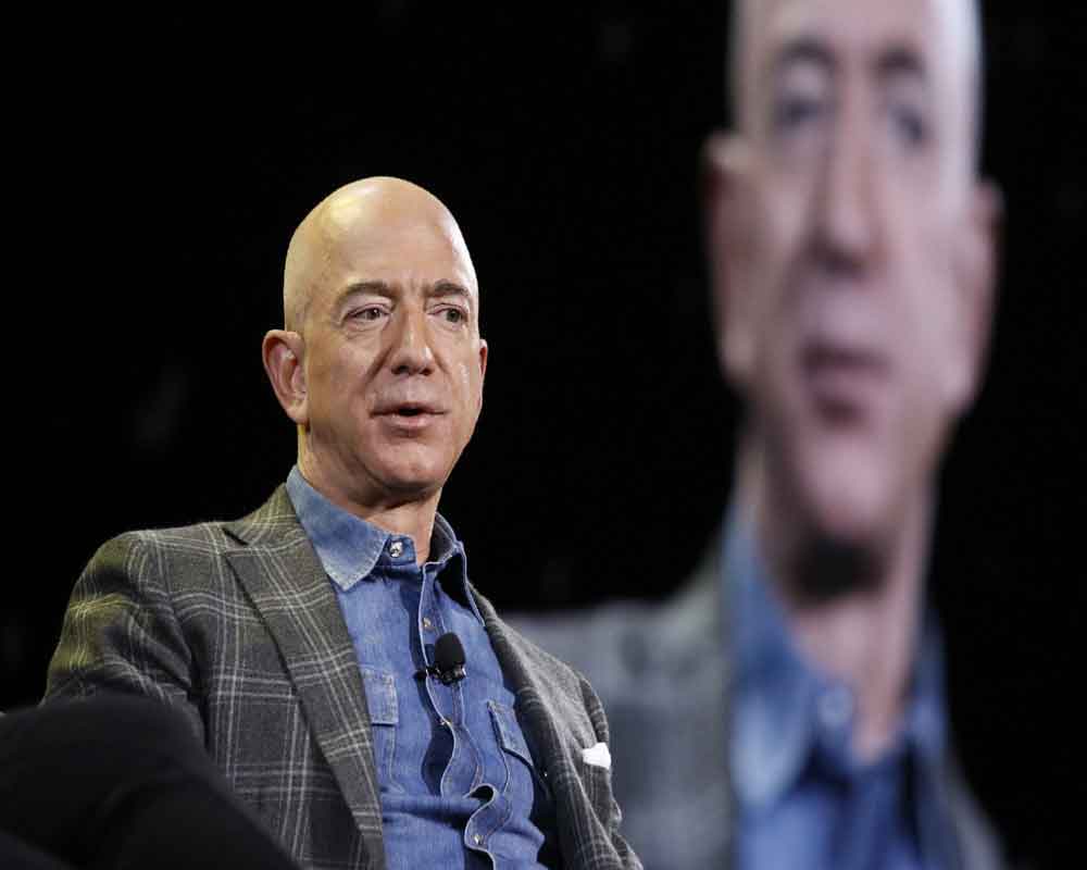 Amazon's record profit run ends, Bezos high on Prime delivery