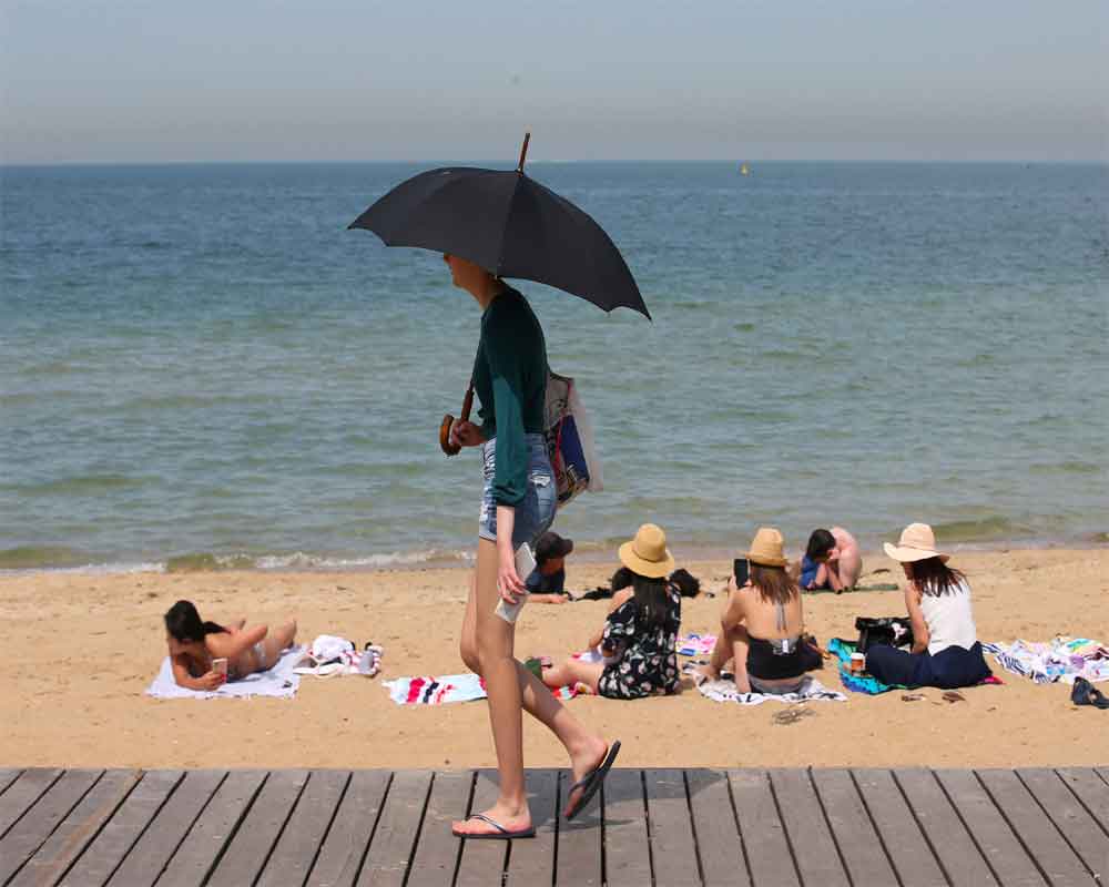 Australia beats hottest day record by full degree