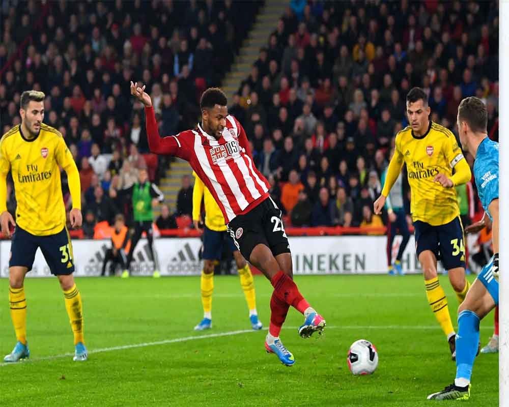 Blades burst Arsenal bubble as Mousset strikes