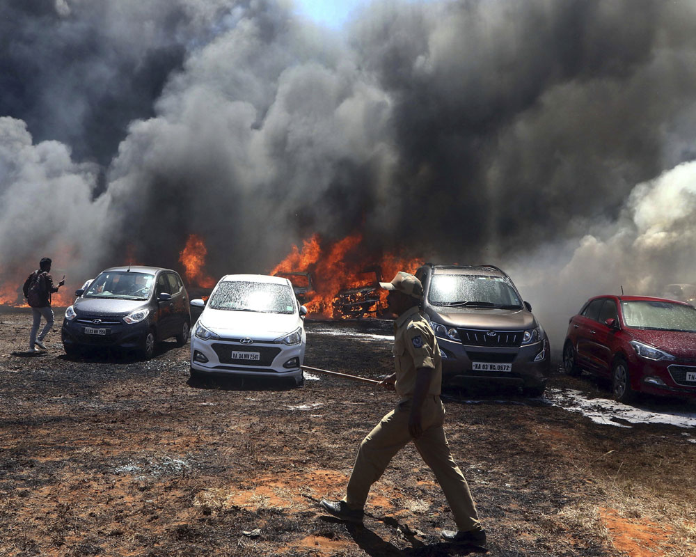 Blaze in Aero India parking area guts 300 cars, no casualties; event goes on as scheduled