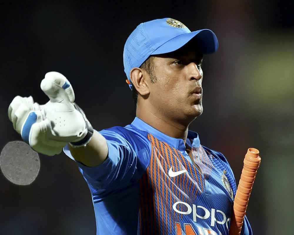 Dhoni gets hit on forearm during net session