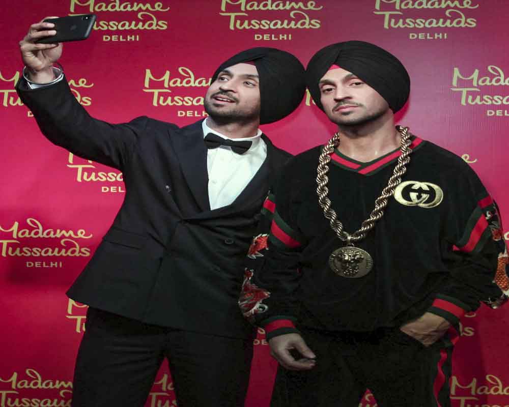 Diljit Dosanjh unveils his wax statue at Delhi's Madame ...