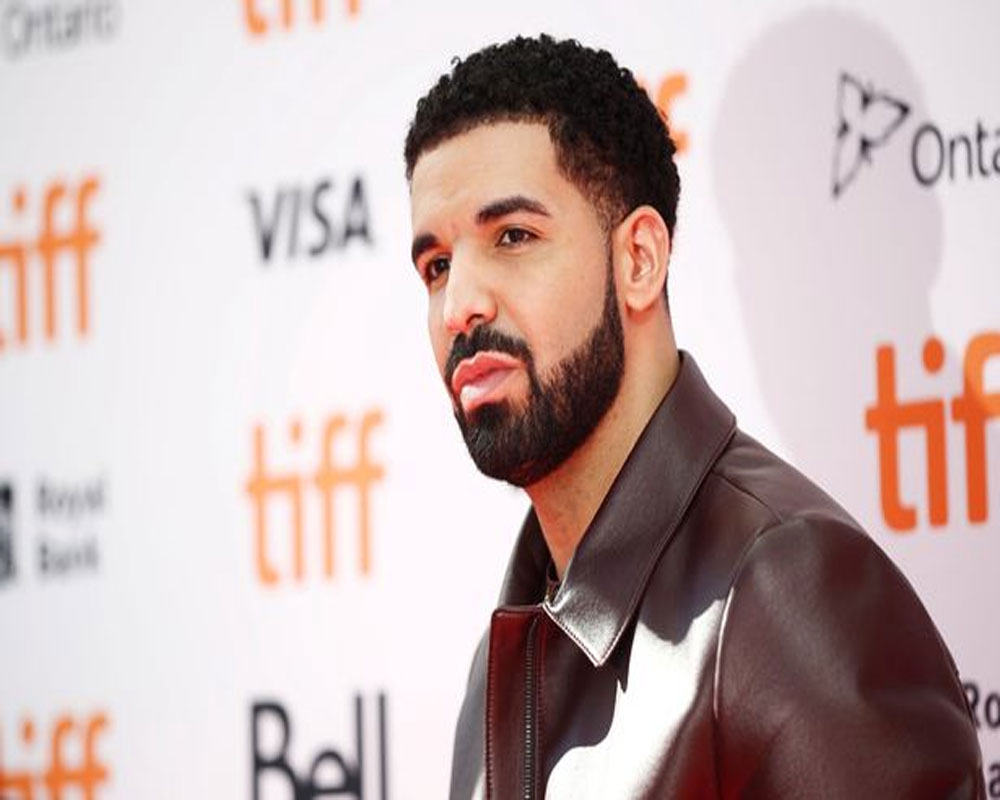 Drake under fire for kissing a minor