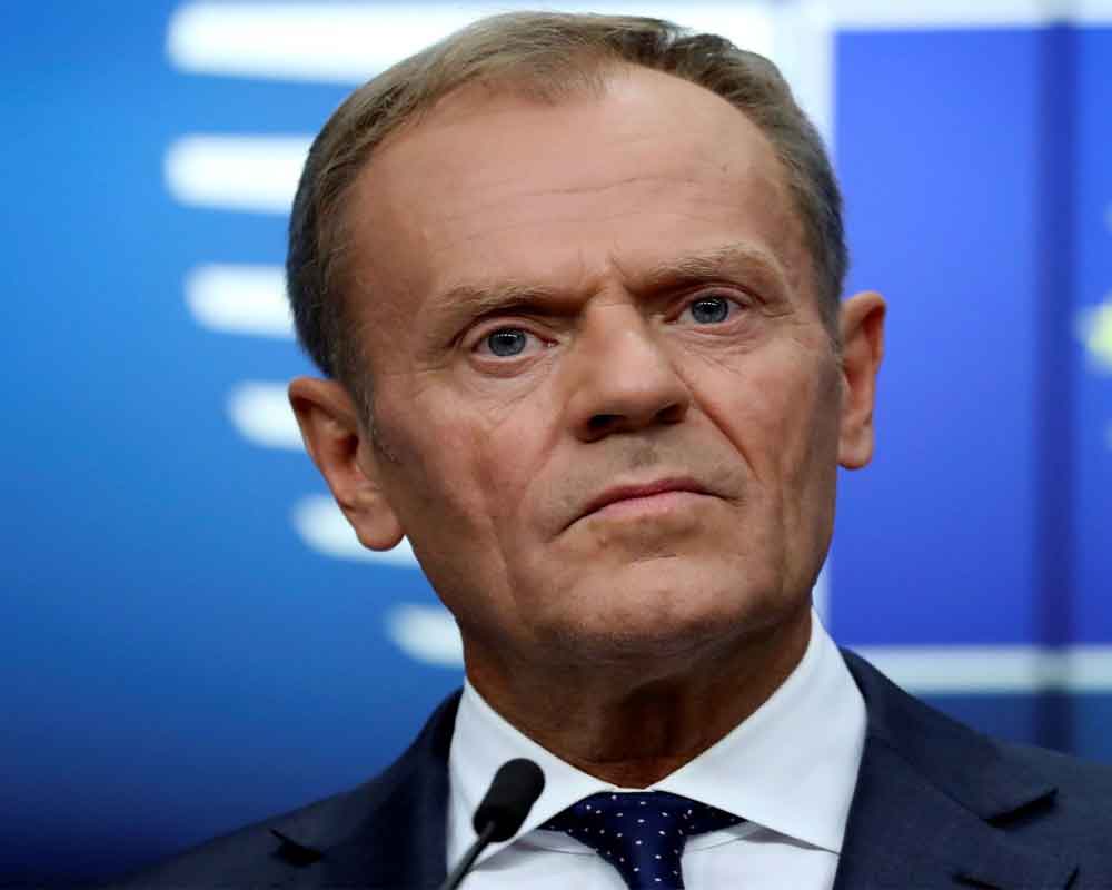 EU's Tusk lashes out at Putin on democracy