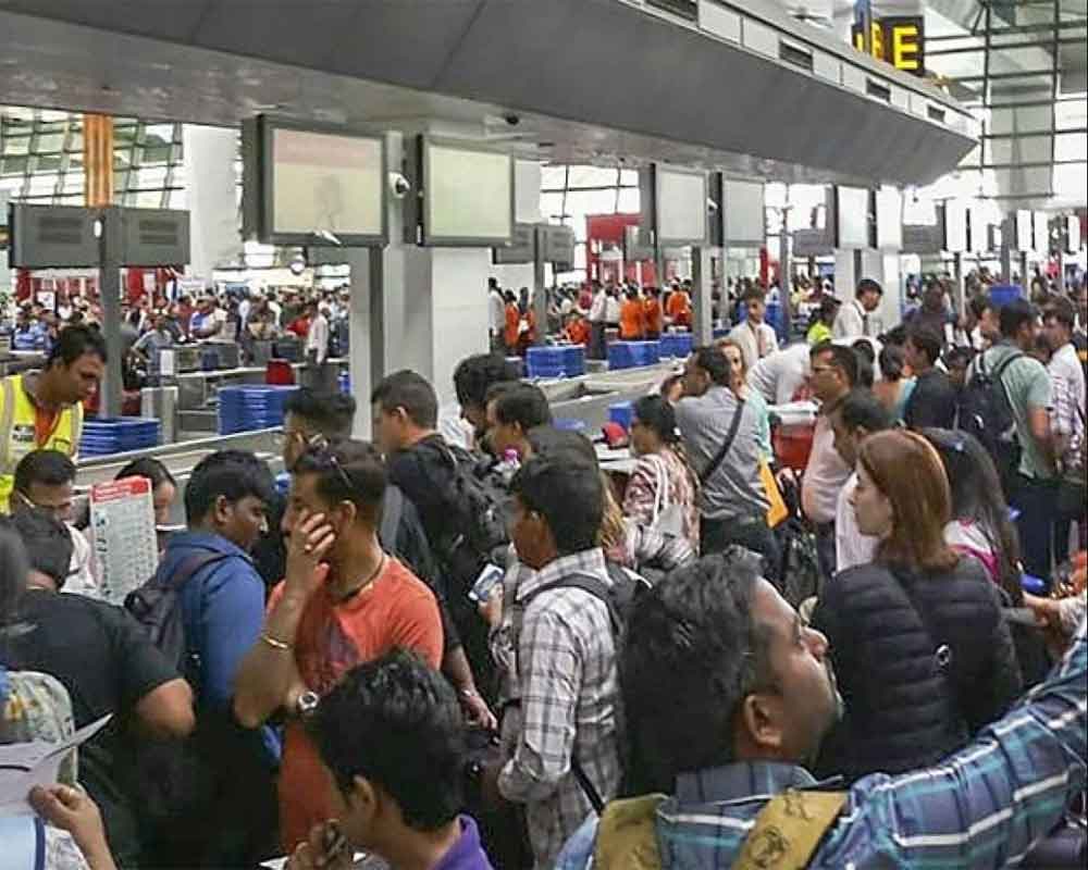 Immigration system server face glitches at Delhi airport; long queues  at counters