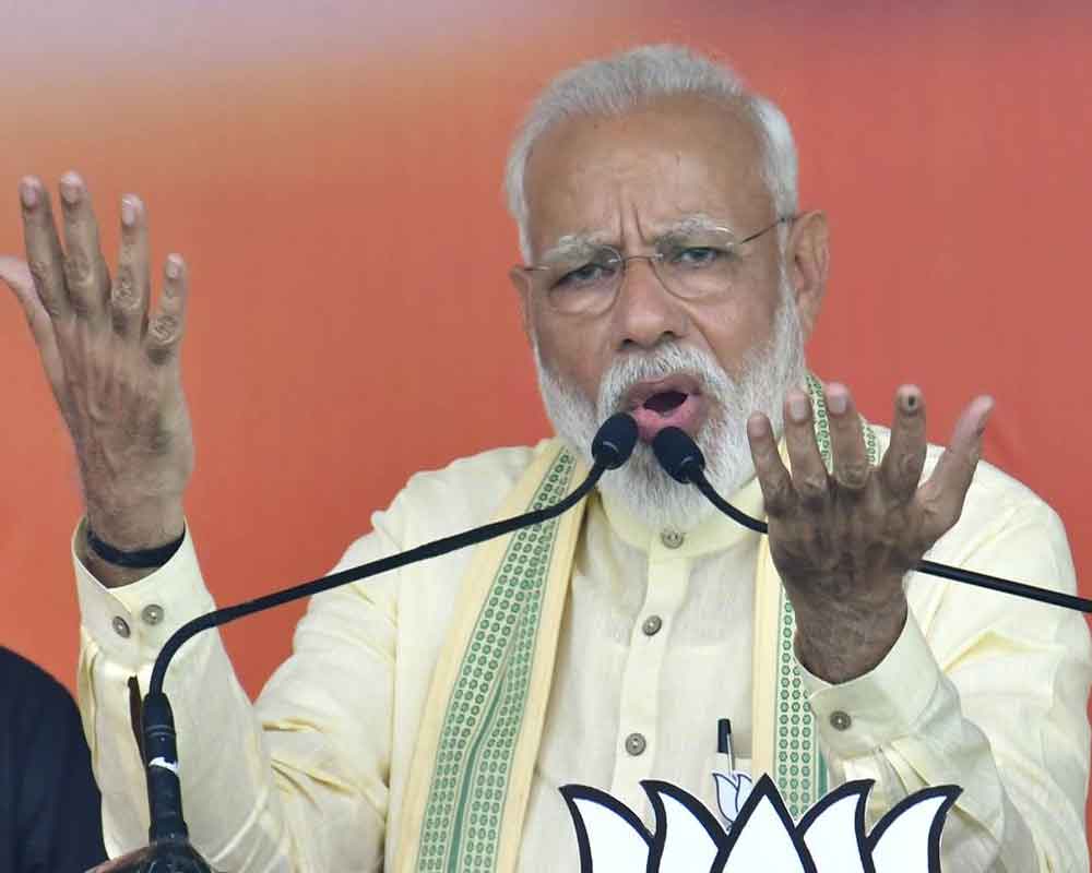 More they abuse, the more people love me: Modi