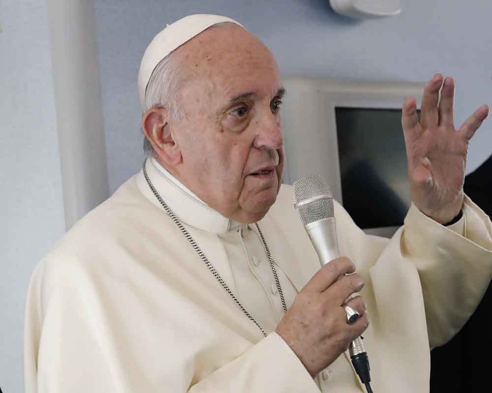 Pope defends raid on financial unit despite criticism