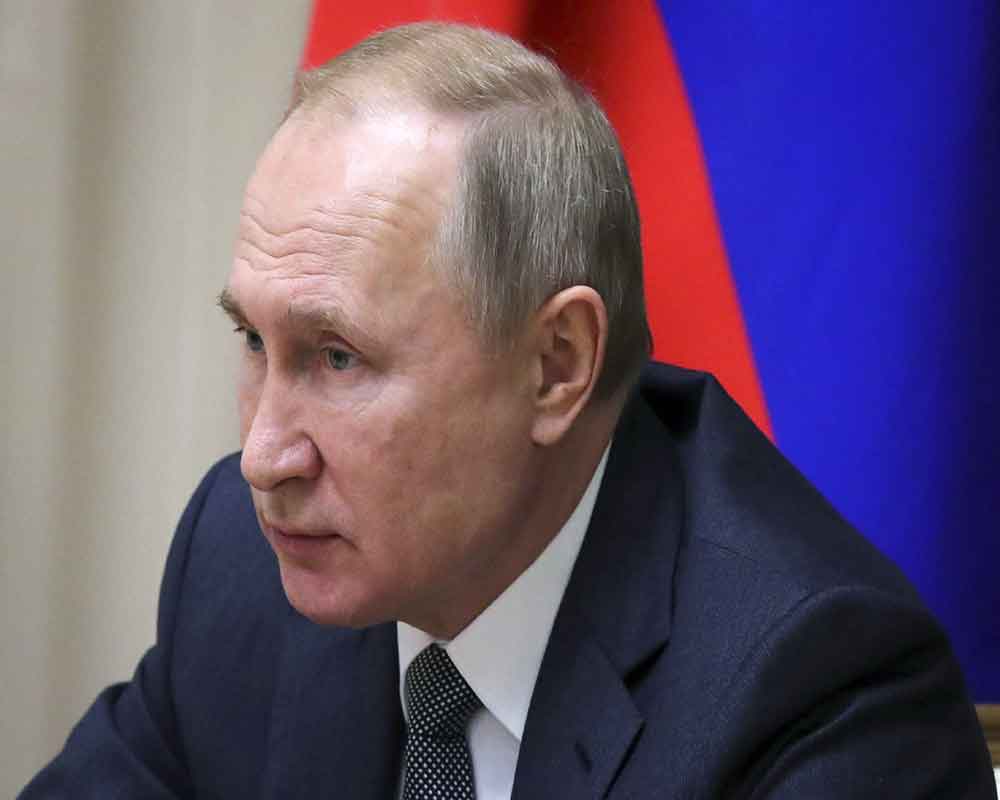 Putin Signs Off Law To Label Journalists As Foreign Agents