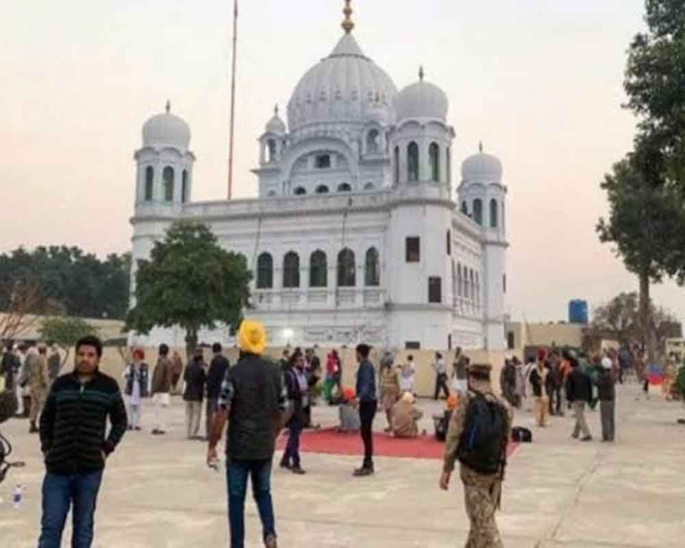 Sikhs from India visit Kartarpur Sahib gurdwara in Pakistan, instal golden palanquin