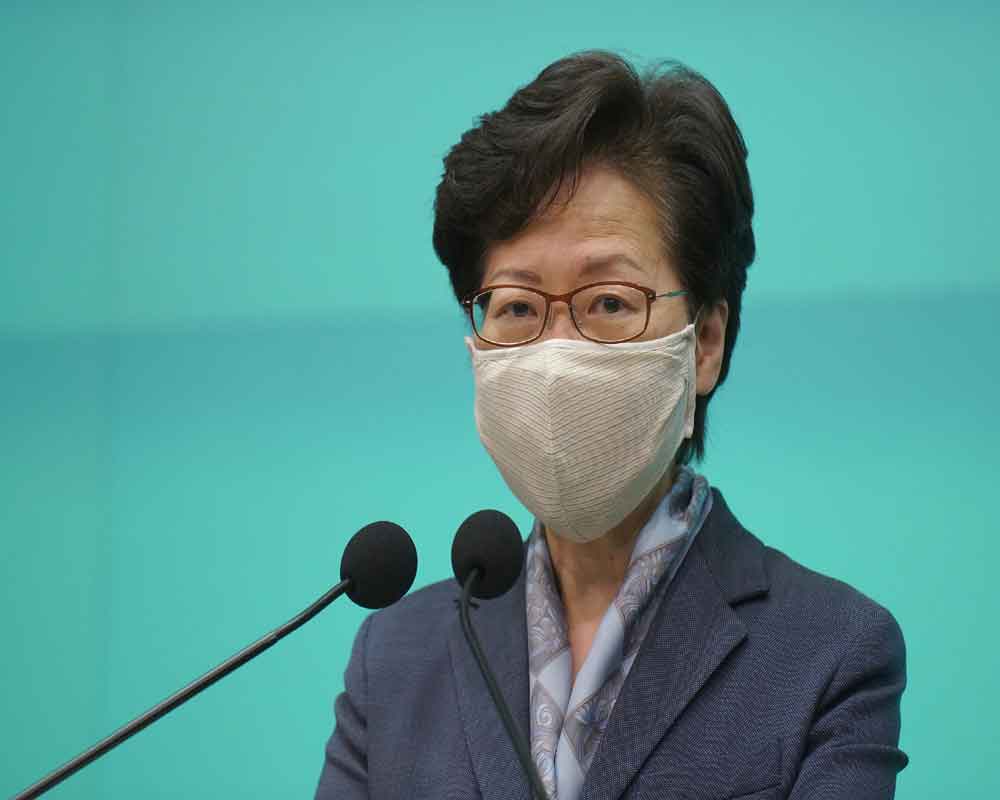 Hong Kong leader says all should learn from year of protests