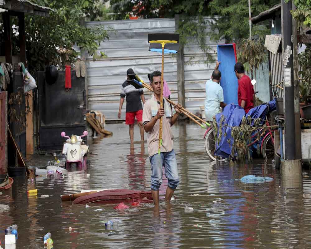 Indonesia flood rescuers hunt for missing after 43 killed