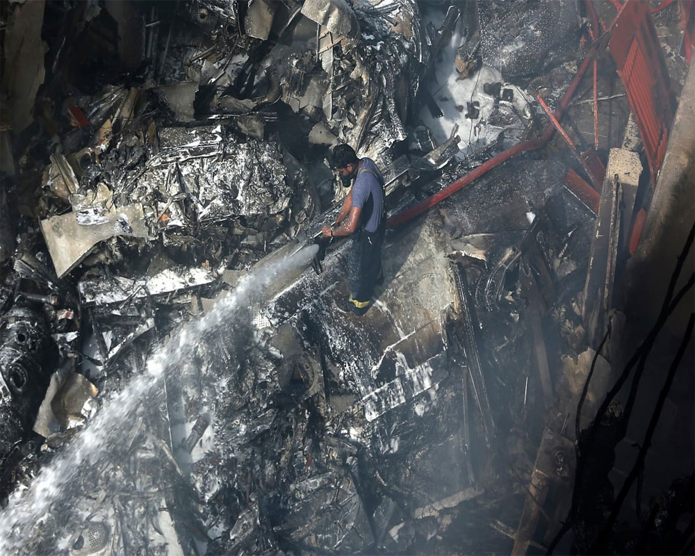 It was all 'fire and smoke': eyewitnesses recount Pak plane crash