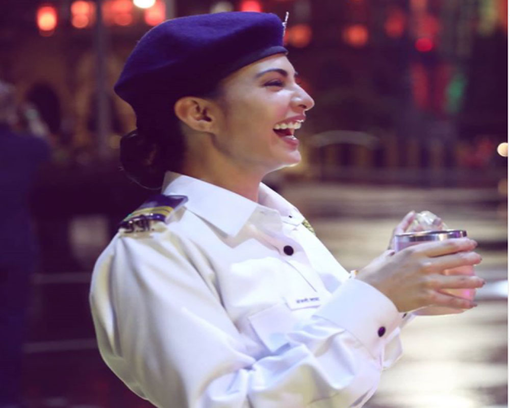 Jacqueline dresses up as police officer for 'fun project'