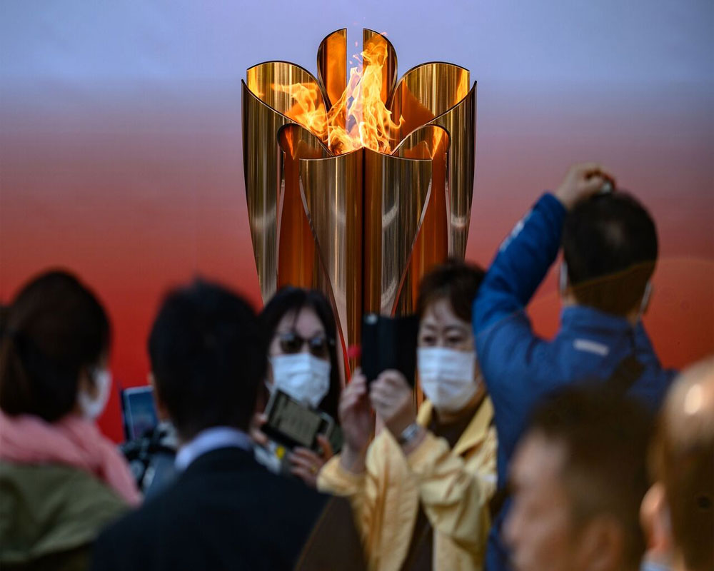 Japan ends Olympic flame display due to virus