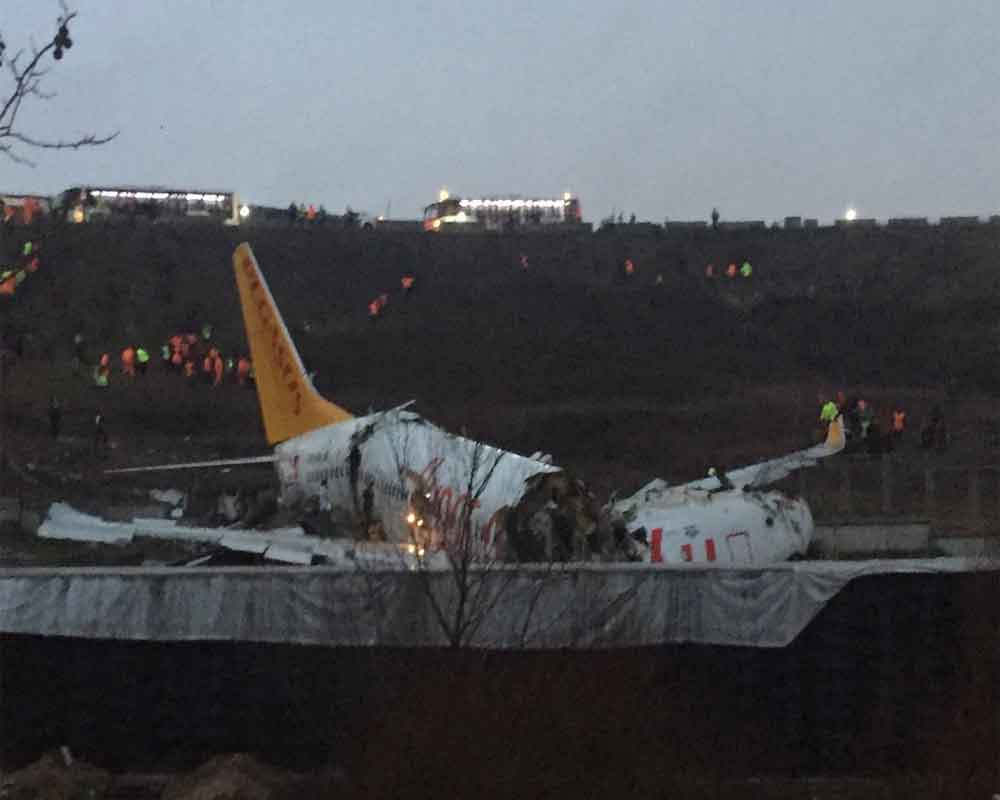 Plane breaks into three after skidding off Istanbul runway