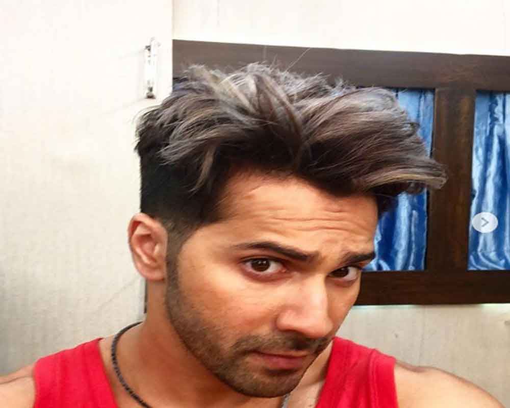 Varun Dhawan experiments with purple hair colour leaves netizens gushing  over it See pic