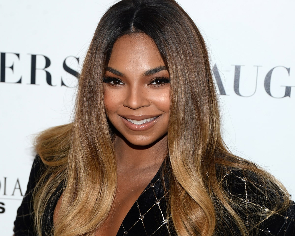 Ashanti announces she and family are free of COVID-19