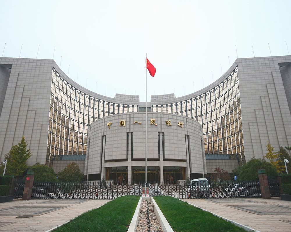 China's central bank tries to stop surge in currency's value