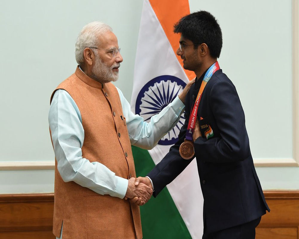 PM Modi congratulates IAS officer on medal win at Paralympics