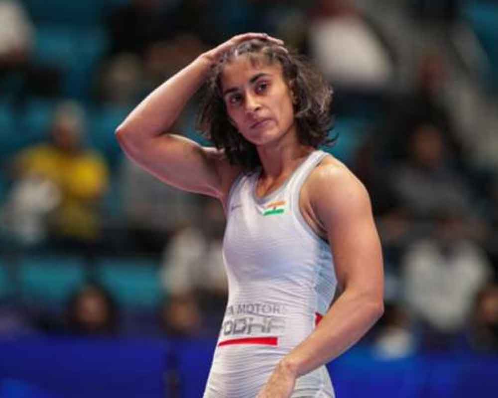 Vinesh Phogat loses in quarters, Anshu bows out after ...