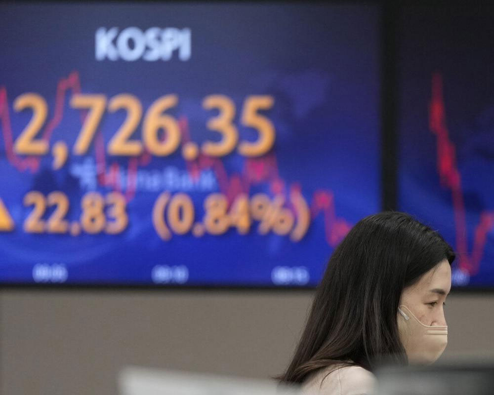 Asian shares slide as Russia shells Ukraine nuclear plant