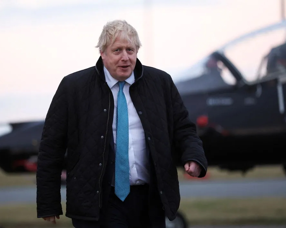 Boris Johnson tries to change subject from ''partygate'' woes