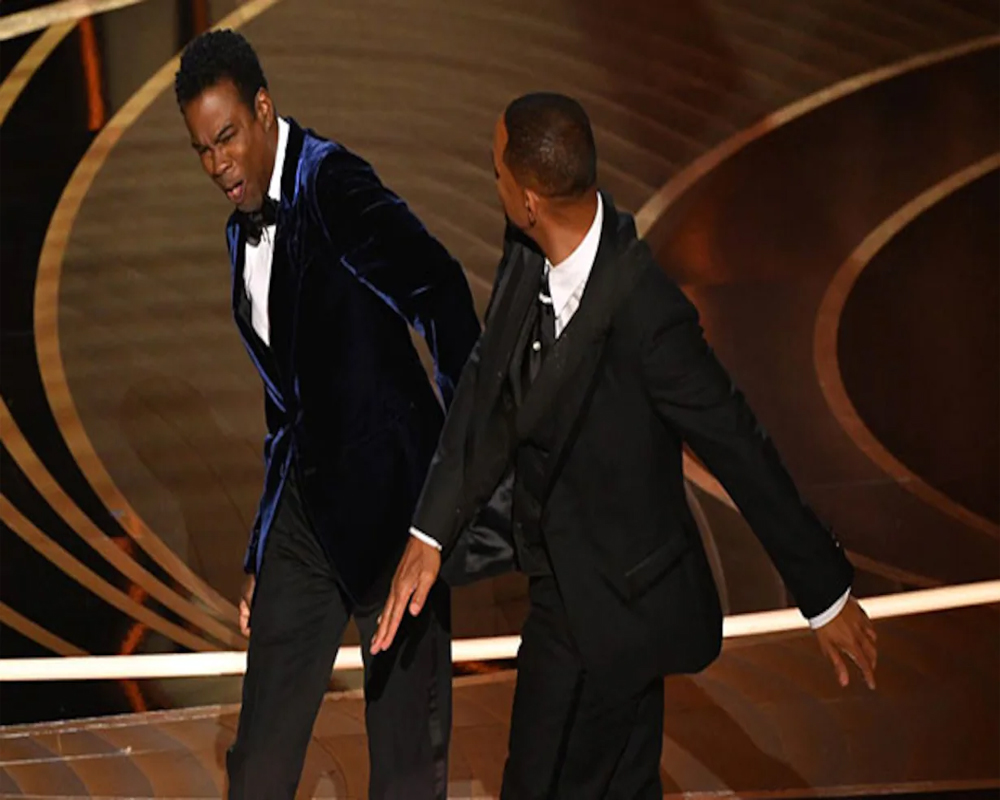 Chris Rock gets standing ovation at comedy show, says will talk about  Oscars slap 'at some point'