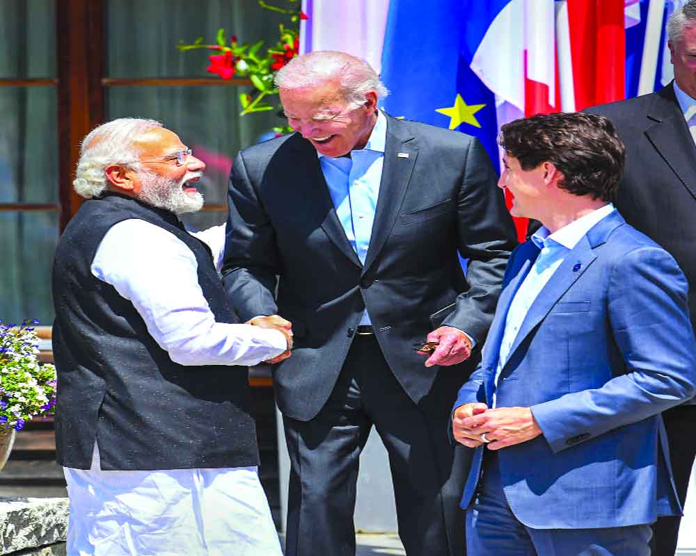 Invest in clean energy research in big market India: PM to G7