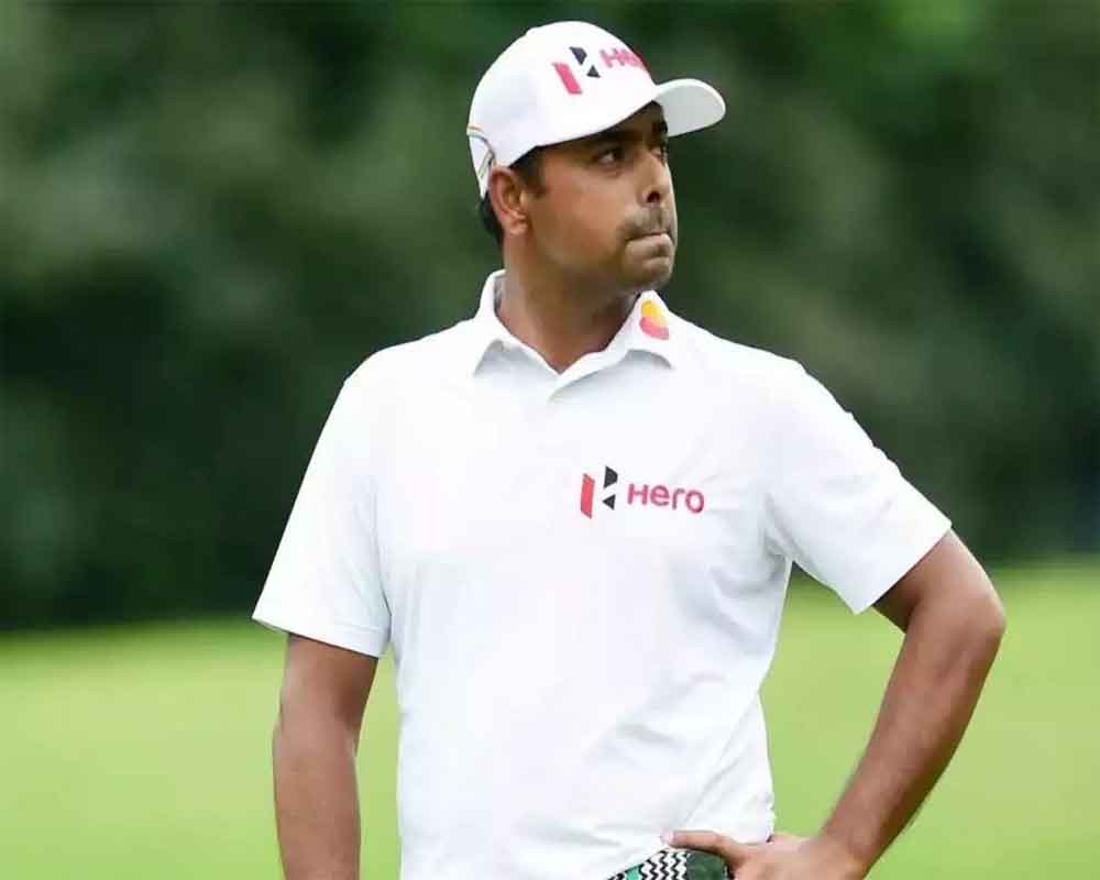 Lahiri battles cold, wet and windy conditions to rise to third at Wells Fargo