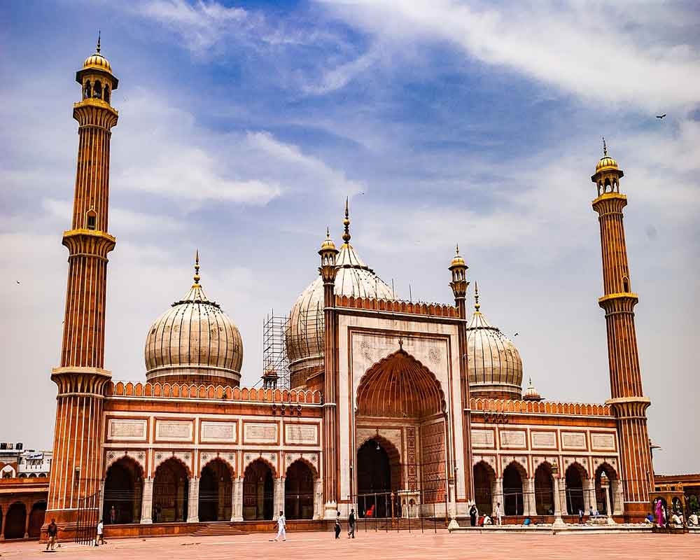 Pieces of dome's finial lying on Jama Masjid terrace brought down using skylift, stored