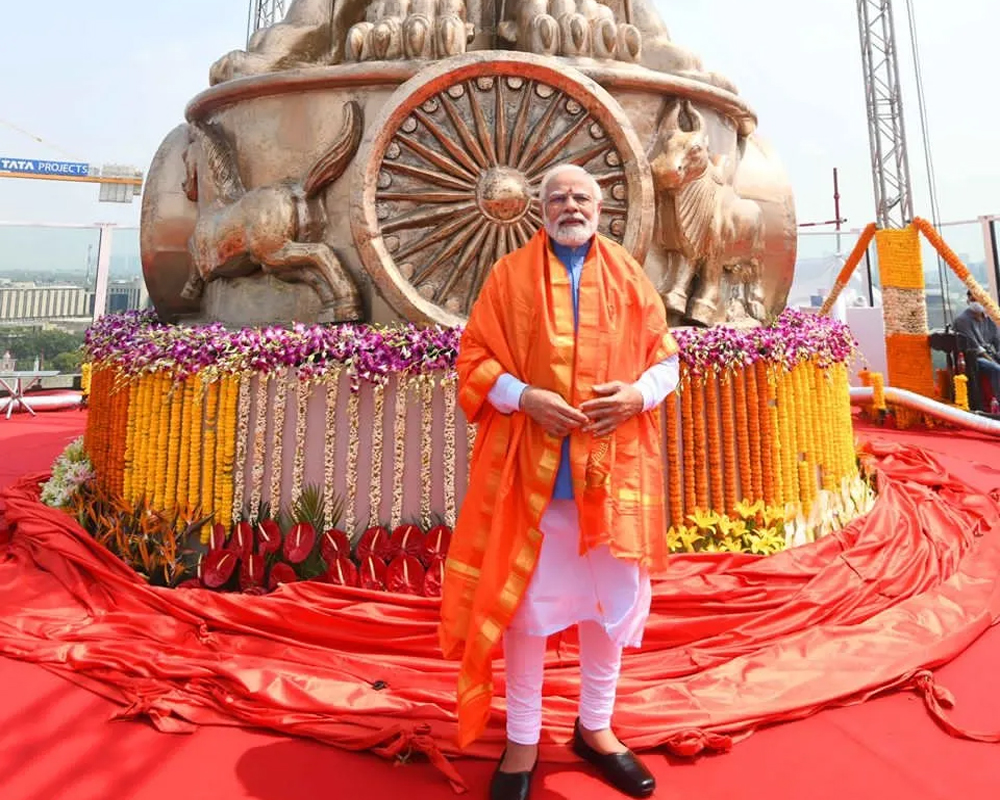 PM Modi unveils national emblem on new Parliament building