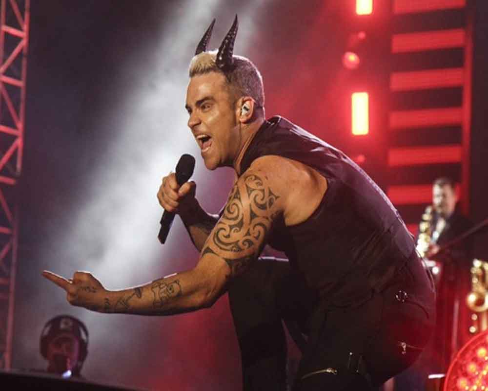 Robbie Williams believes drugs let real demons into your life