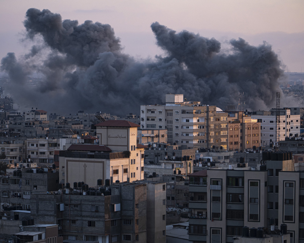 As strikes devastate Gaza, Israel forms unity government to oversee war sparked by Hamas attack