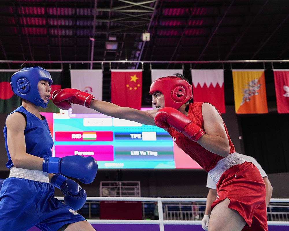 Boxer Parveen Hooda signs off with bronze after losing SF