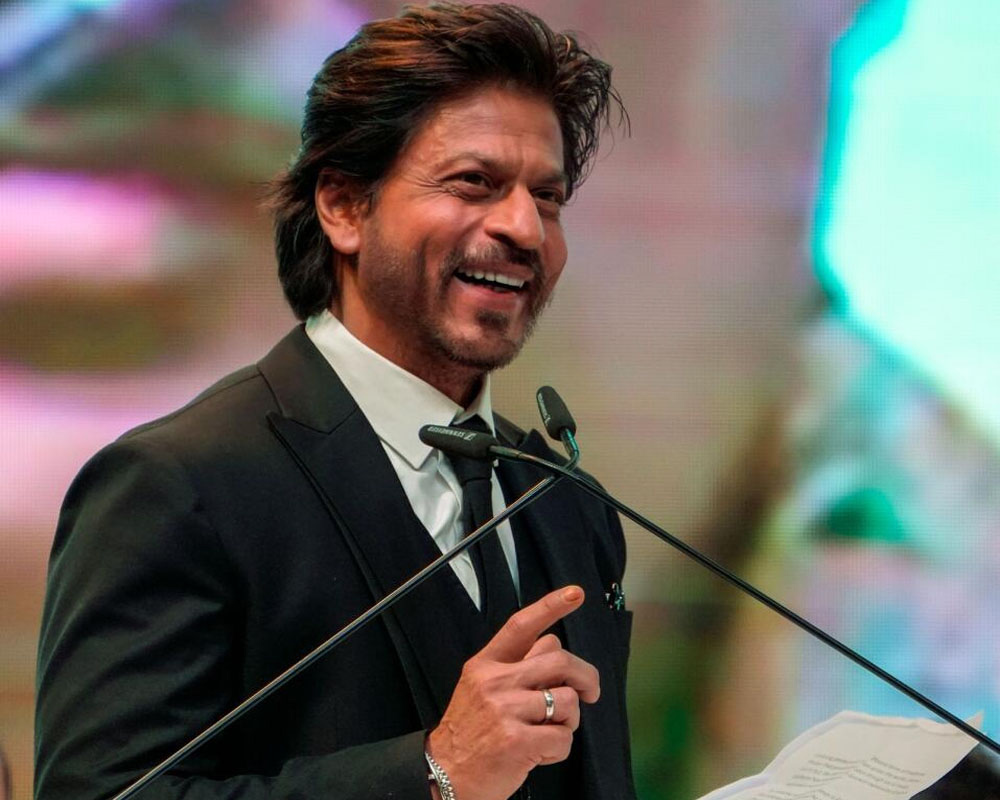 Like being a romantic hero wielding a big gun, says Shah Rukh Khan