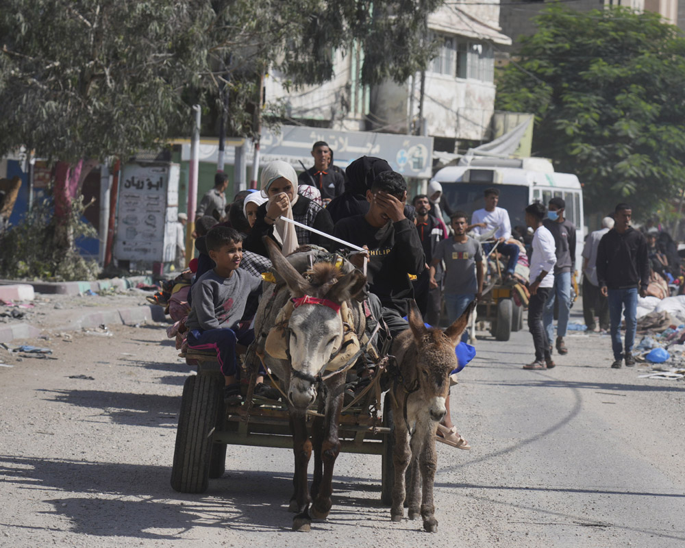 Palestinians flee northern Gaza after Israel orders mass evacuation with ground attack looming