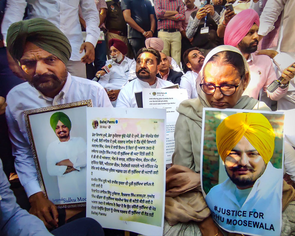 Sidhu Moosewala's parents sit outside Punjab Vidhan Sabha complex to seek justice for son