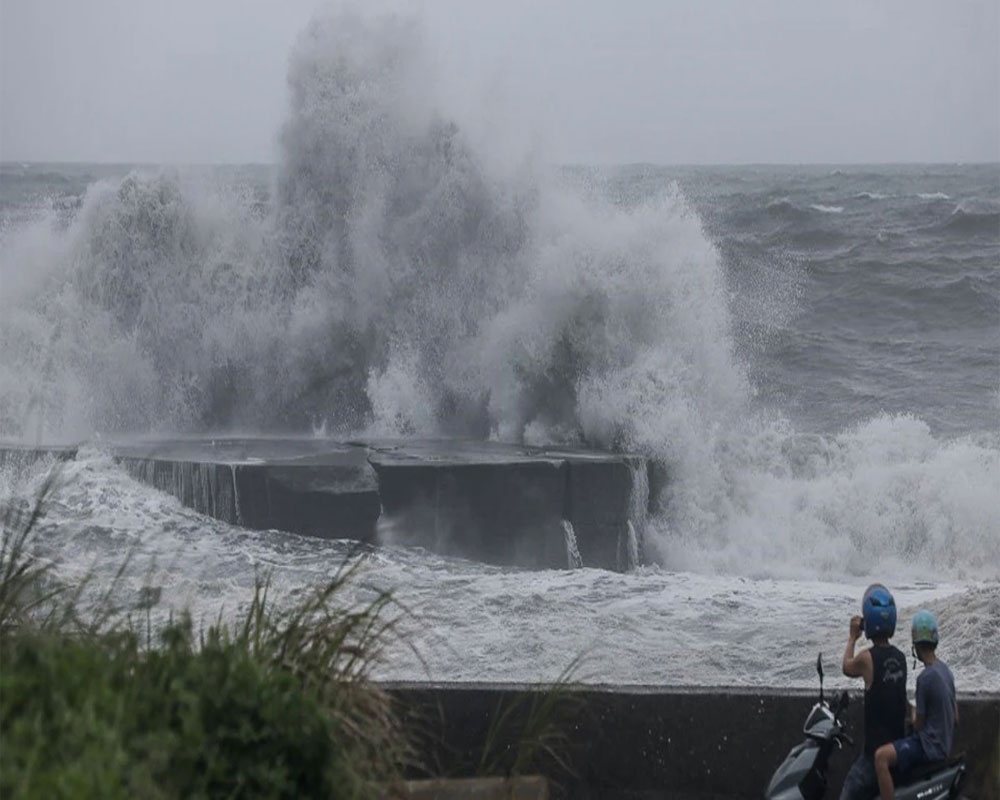 Taiwan suspends work, transport and classes as Typhoon Haikui slams into the island