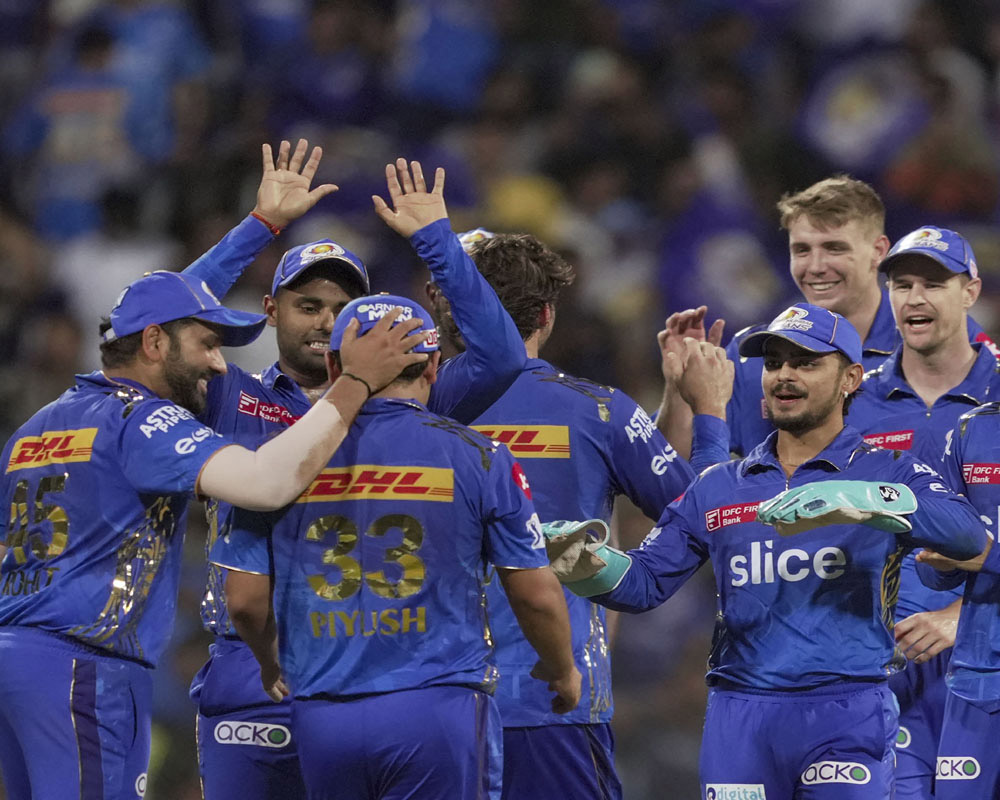 Upbeat MI to take on GT's might in vital IPL clash